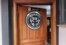 Acusado de ferir homem com facão em bar se apresenta à polícia e diz que foi provocado