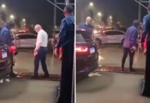 Lula atravessa área alagada após entrega de casas em Belém