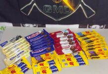Homem é preso após furtar 34 barras de chocolate e carregar munições em Dourados