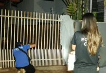 Homem morre ao ficar com a cabeça presa em portão de residência